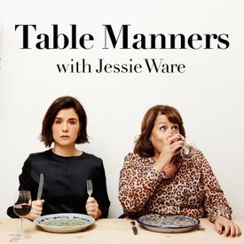 Two women sitting at a dinner table 