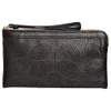 Orla Kiely Women's Sixties Stem Punched Leather Flat Zip Purse - Black - Image 1
