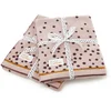 Done by Deer Happy Dots Knitted Blanket - Powder - Image 1