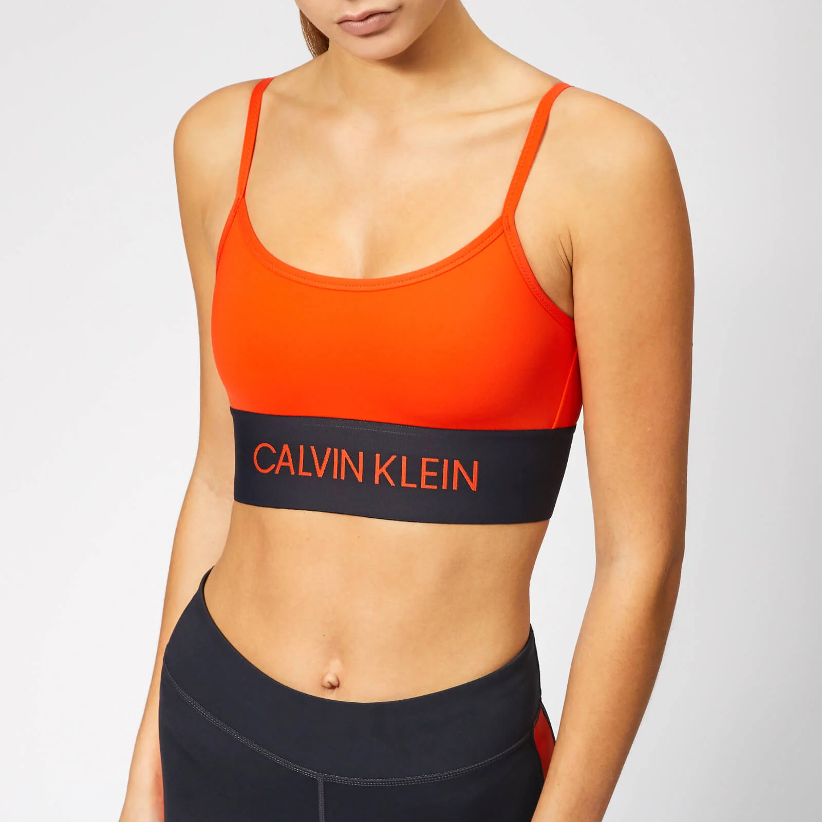 Calvin Klein Performance Women's Strappy Sports Bra - Cherry Tomato Image 1