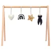 The Little Green Sheep Wooden Baby Play Gym and Charms Set - Rainbow Midnight - Image 1