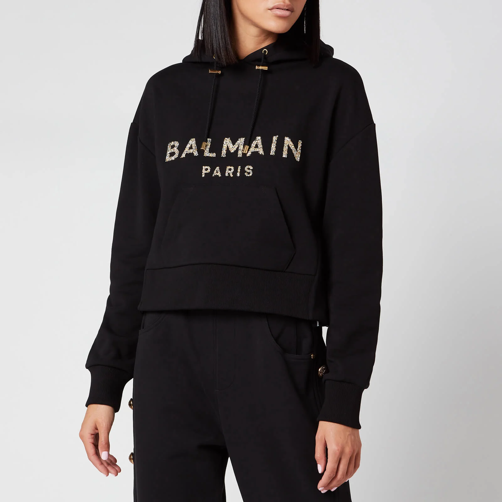 Balmain Women's Cropped Sequined Logo Hoodie - Black Image 1