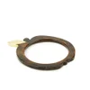 A.P.C. Women's Eve Bracelet - Brass and Resin - Image 1