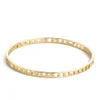 Marc by Marc Jacobs Women's Tiny Cut It Out Logo Bangle - Oro - Image 1