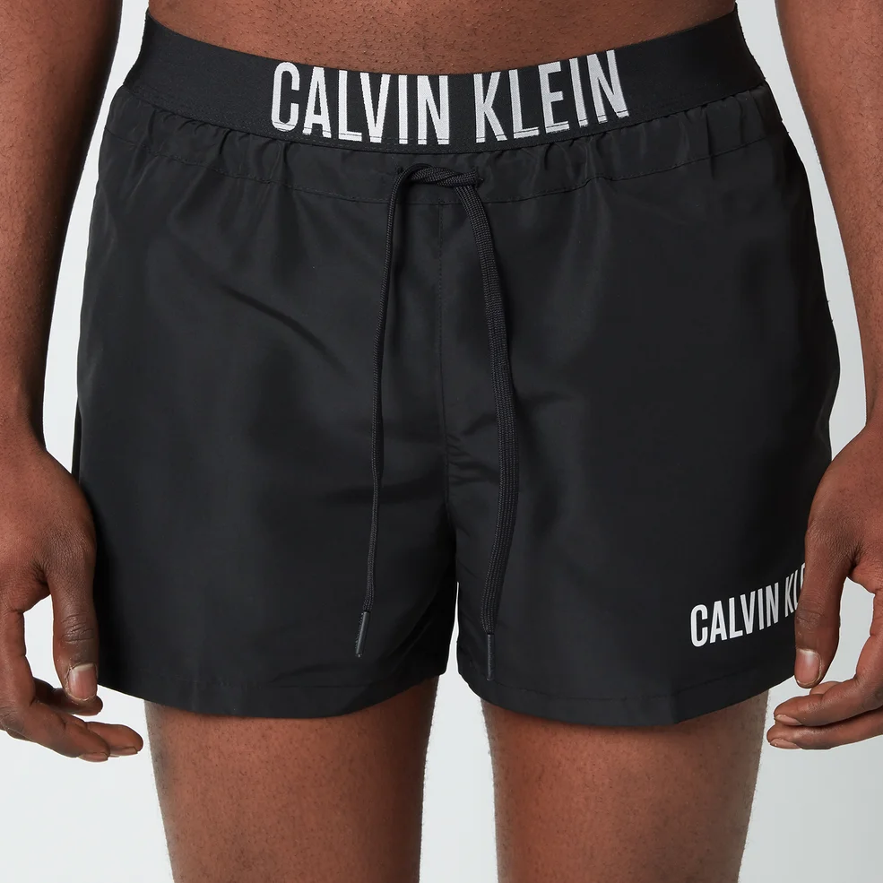 Calvin Klein Men's Waistband Logo Drawstring Swim Shorts - PVH Black Image 1