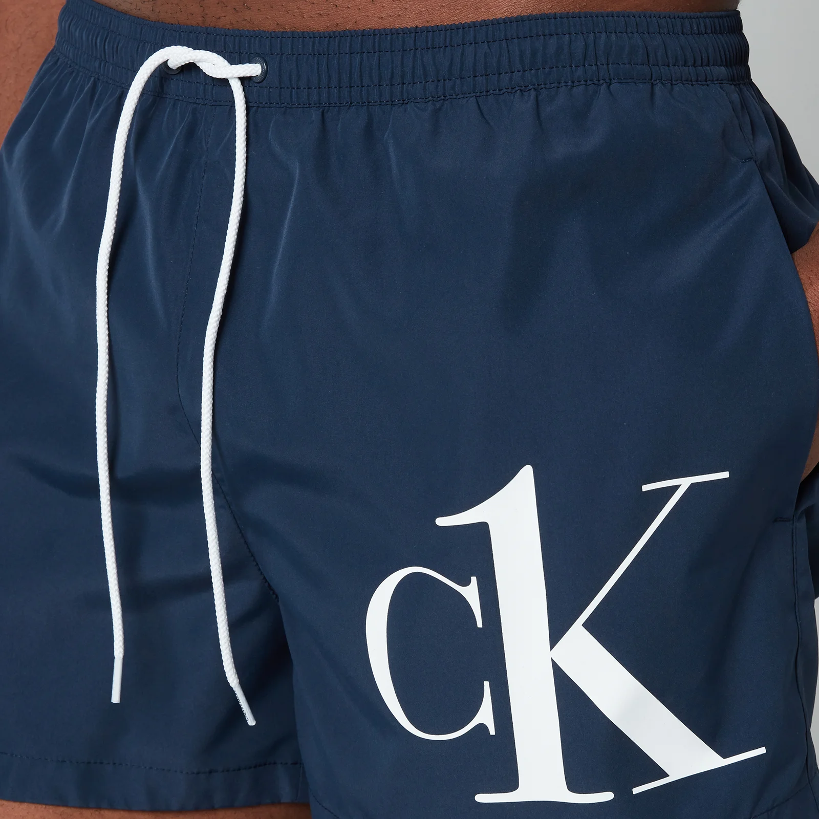 Calvin Klein Men's CK Logo Drawstring Swim Shorts - Black Iris Image 1