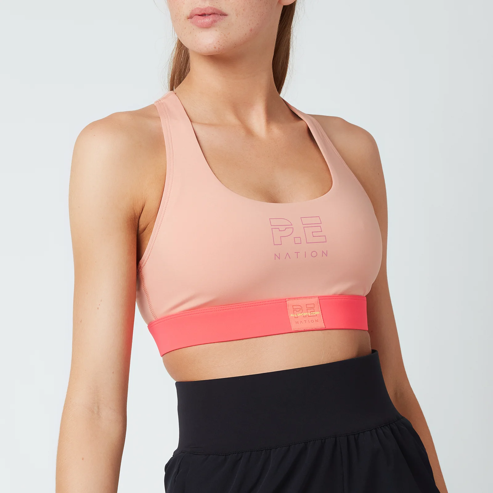P.E Nation Women's Box Out Sports Bra - Coral Mid Crom Image 1