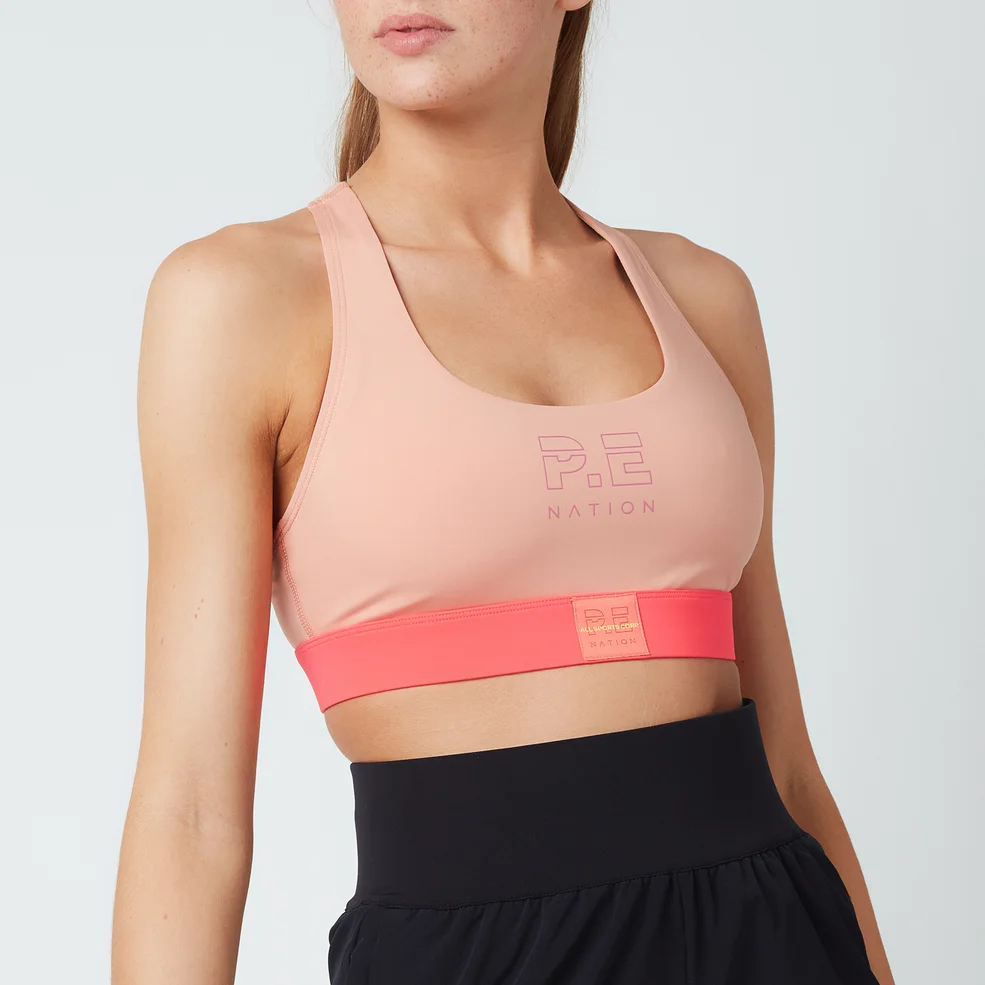 P.E Nation Women's Box Out Sports Bra - Coral Mid Crom Image 1
