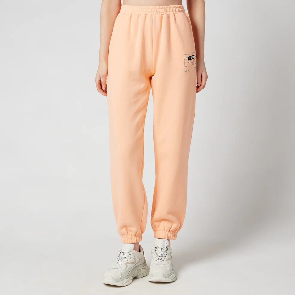 P.E Nation Women's Grand Stand Track Pants - Pastel Peach Image 1
