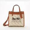 Coach Women's Horse And Carriage Field Tote Bag - Chalk Burnished Amber - Image 1
