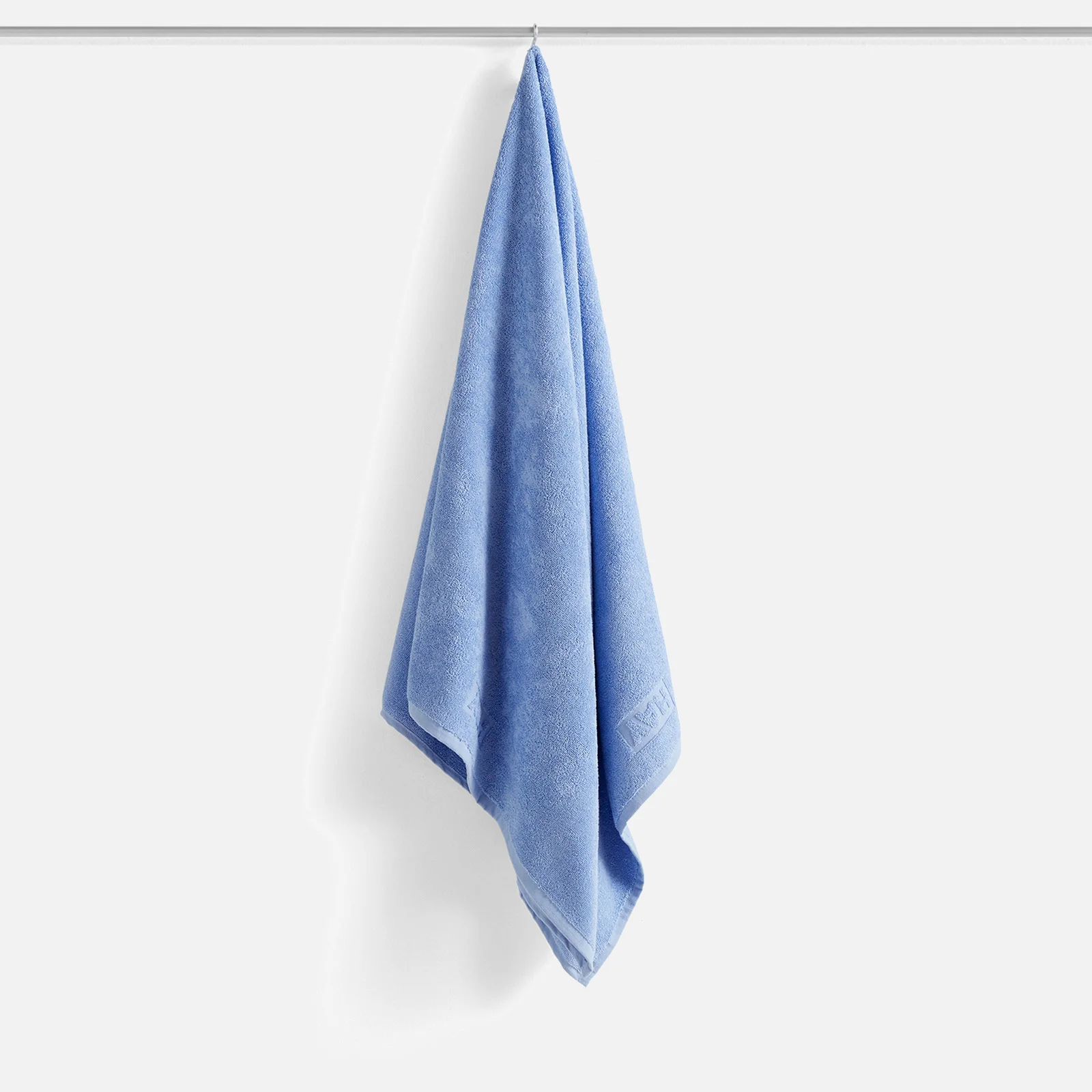 HAY Mono Towel - Sky Blue - Hand Image 1